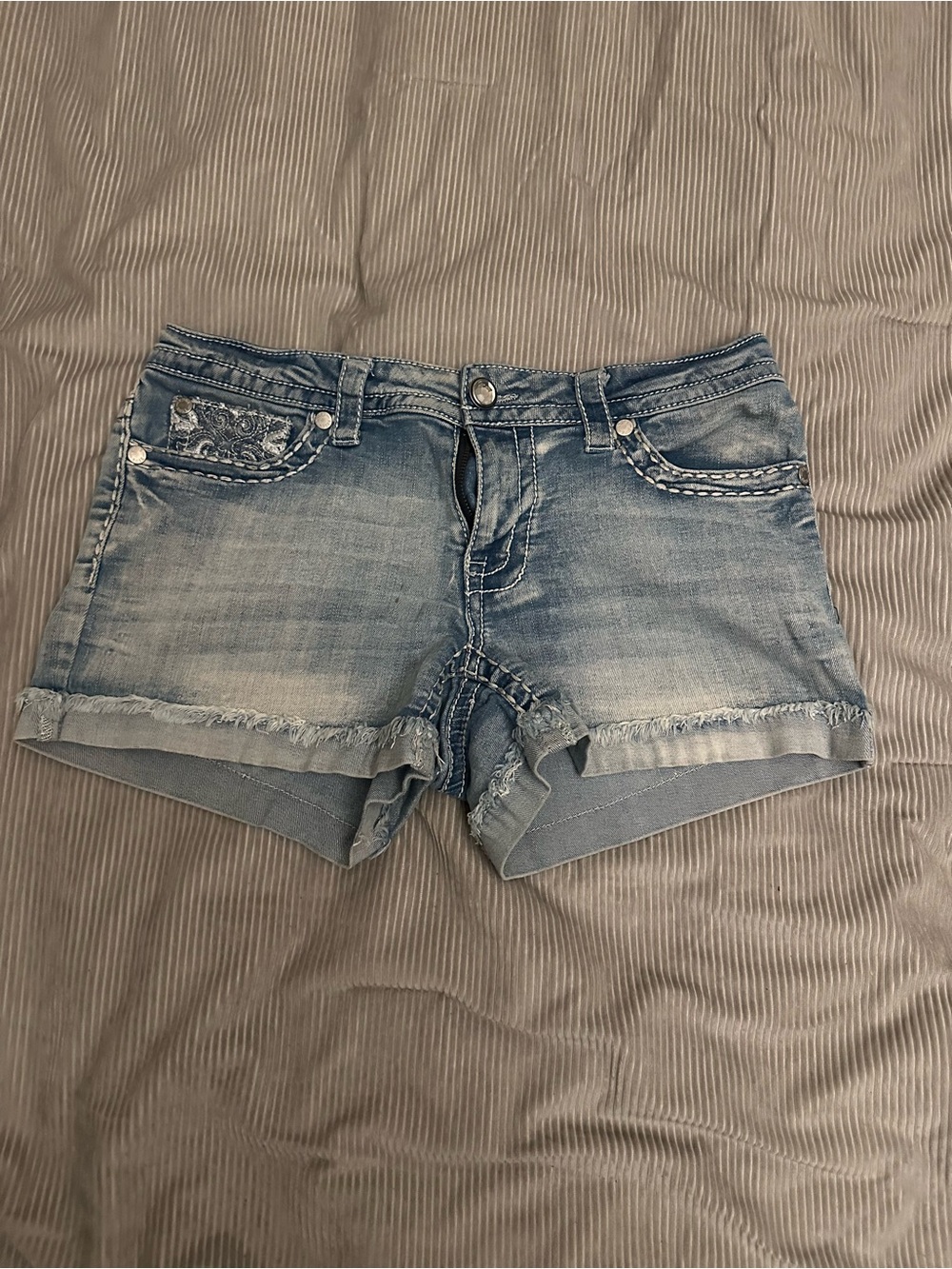 Women’s Light Blue Denim Shorts with Distressed Hem